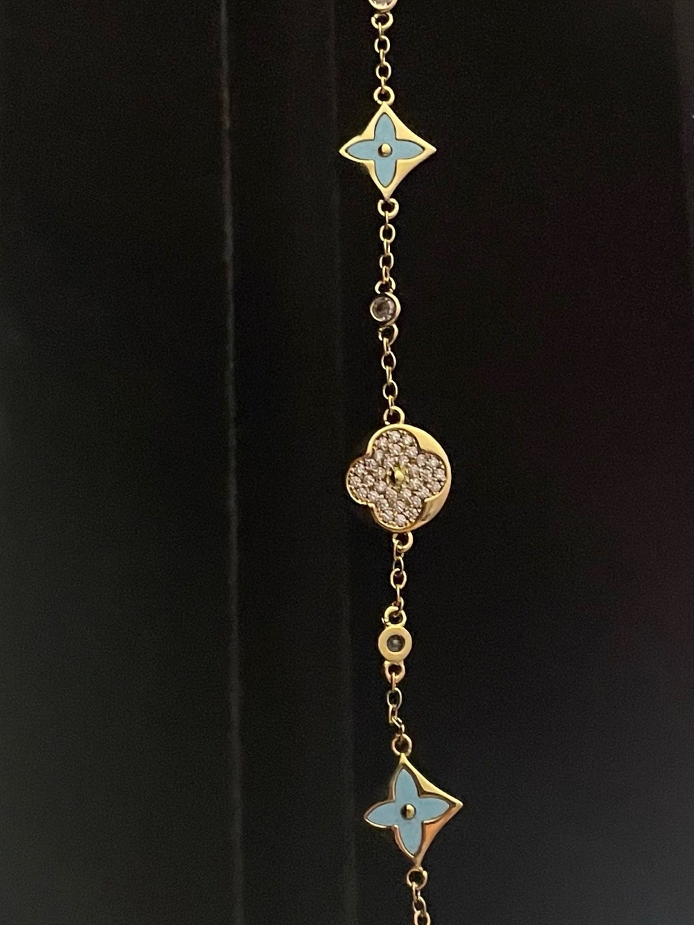Gold-Tone Bracelet with Light Blue Floral Accents